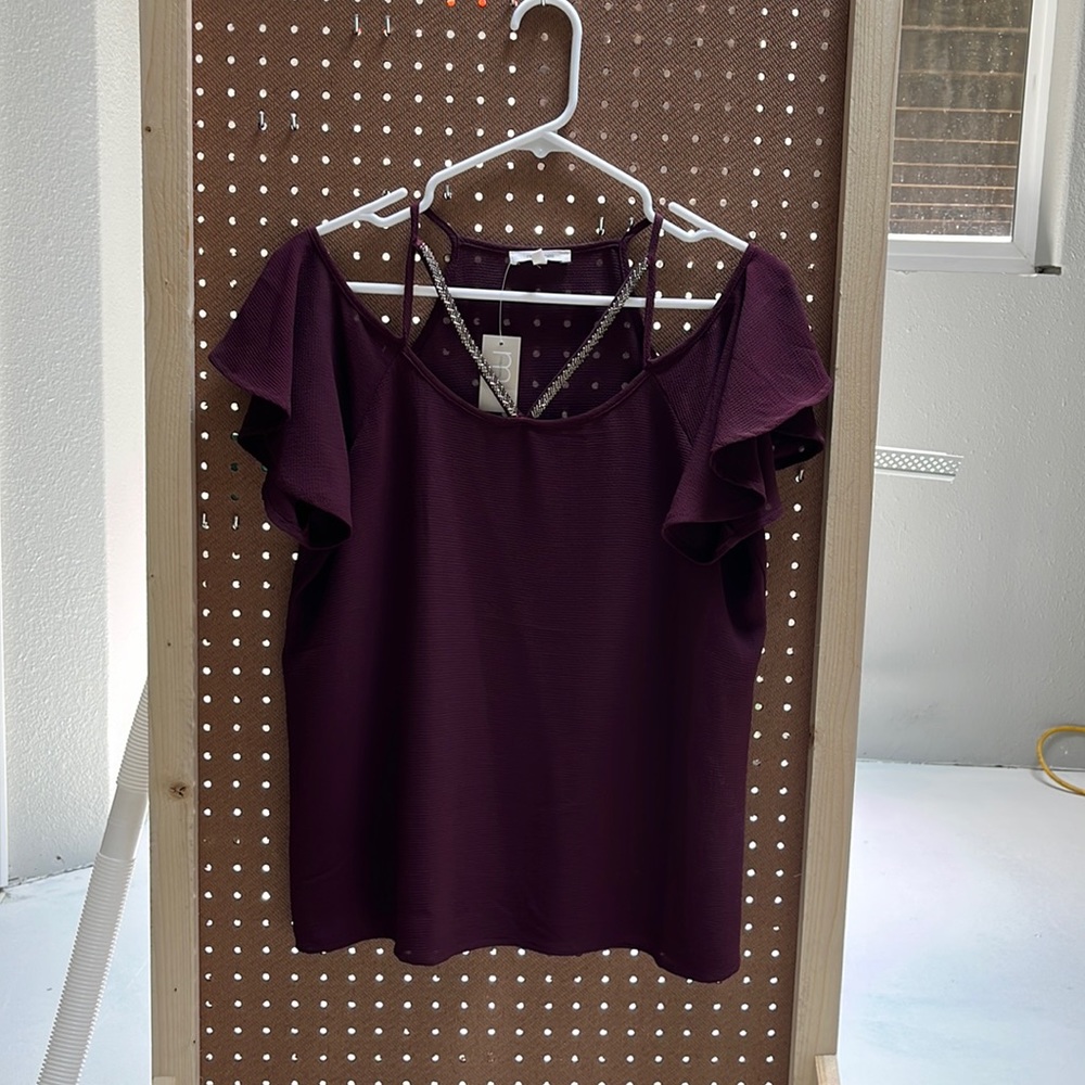 Woman’s Maurice’s blouse size Medium.
